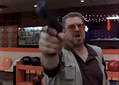 John Travolta points gun in bowling alley