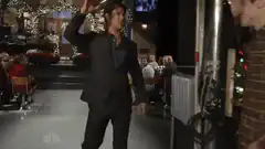 Jim Halpert hits Dwight with a trophy