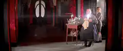 Dracula shaving with a candle