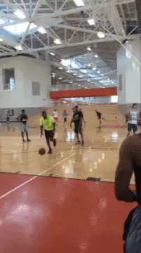Basketball player slips and falls