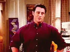 Joey Tribbiani smiling and laughing