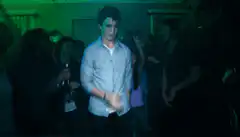Guy dancing awkwardly at a party