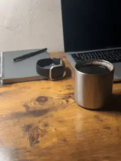 coffee cup on wooden desk