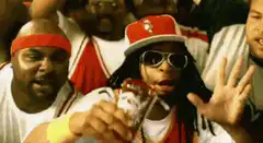 Snoop Dogg drinks from a cup