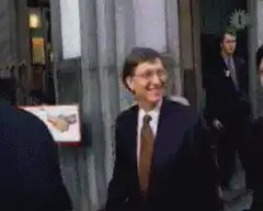 Bill Gates waving to fans
