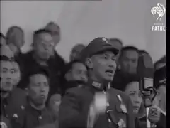 Chiang Kai-shek raises hand in salute