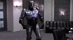 Robocop dancing in an office