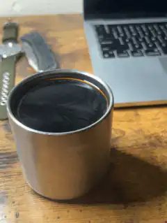 black coffee in metal cup
