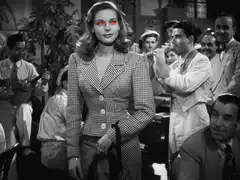 Woman with glowing red eyes