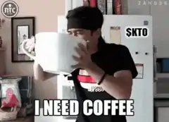 Man drinking from giant coffee mug