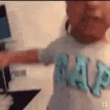 Toddler in GAP shirt looking confused