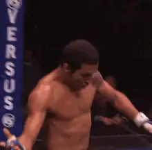 MMA fighter celebrates in octagon