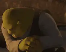 Shrek looking sad and pensive