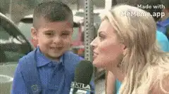 Crying boy covers his face