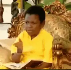 Young boy in yellow shirt talking and gesturing
