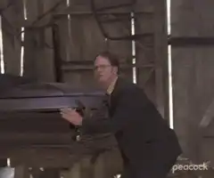 Michael Scott tells Dwight to get in the coffin