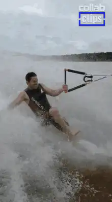 Man wakesurfing and losing his grip