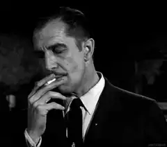 Vincent Price smoking cigarette