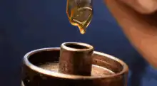 Dripping cannabis oil into a dab rig
