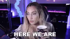 Woman with cup says here we are