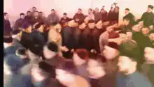 Hasidic men dancing in a circle