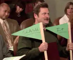 Nick Offerman holding slash and I+ signs