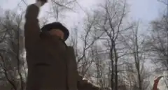 Old man raises arm with text DO MORE