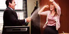 Michael Scott sprays Pam with champagne