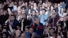 Audience clapping at event