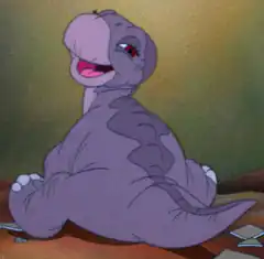 Baby Longneck sitting with a goofy grin