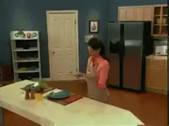 Man dances in kitchen then audience cheers