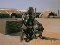 Soldier gets kicked and spins around