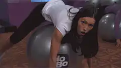 Woman struggling on exercise ball