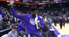 De'Aaron Fox celebrates with a laser beam