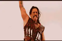 The Warriors crowd cheering with machetes