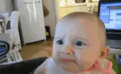 Baby making a skeptical face