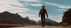 Wolverine walking away from explosion