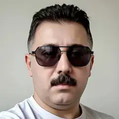 Man with mustache and sunglasses