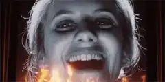Woman laughing while burning