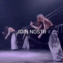 Dancers pulling chains with JOIN NOSTR text