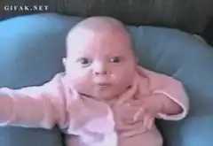 Baby looking confused and suspicious