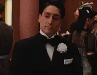 Tom Hanks adjusting his white glove