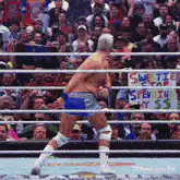 Bret Hart taunting opponent in wrestling ring