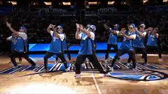 Orlando Magic fan dancing on court