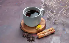 Cup of tea with cinnamon and star anise