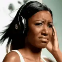 Woman shaking head no with headphones