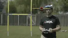 Man flying drone with FPV goggles