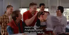 Biff and the gang taunt Marty McFly