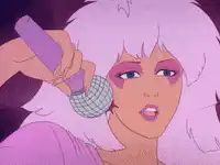 Jade Jolie singing into microphone