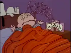 Charlie Brown wakes up to alarm clock